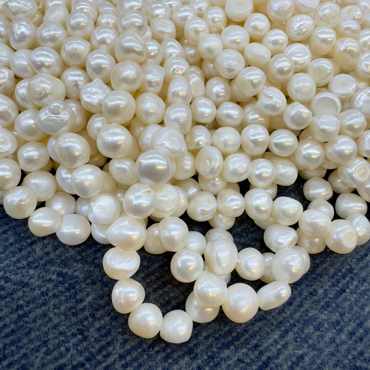 Жемчуг АА культивированный размер 10*10,5мм